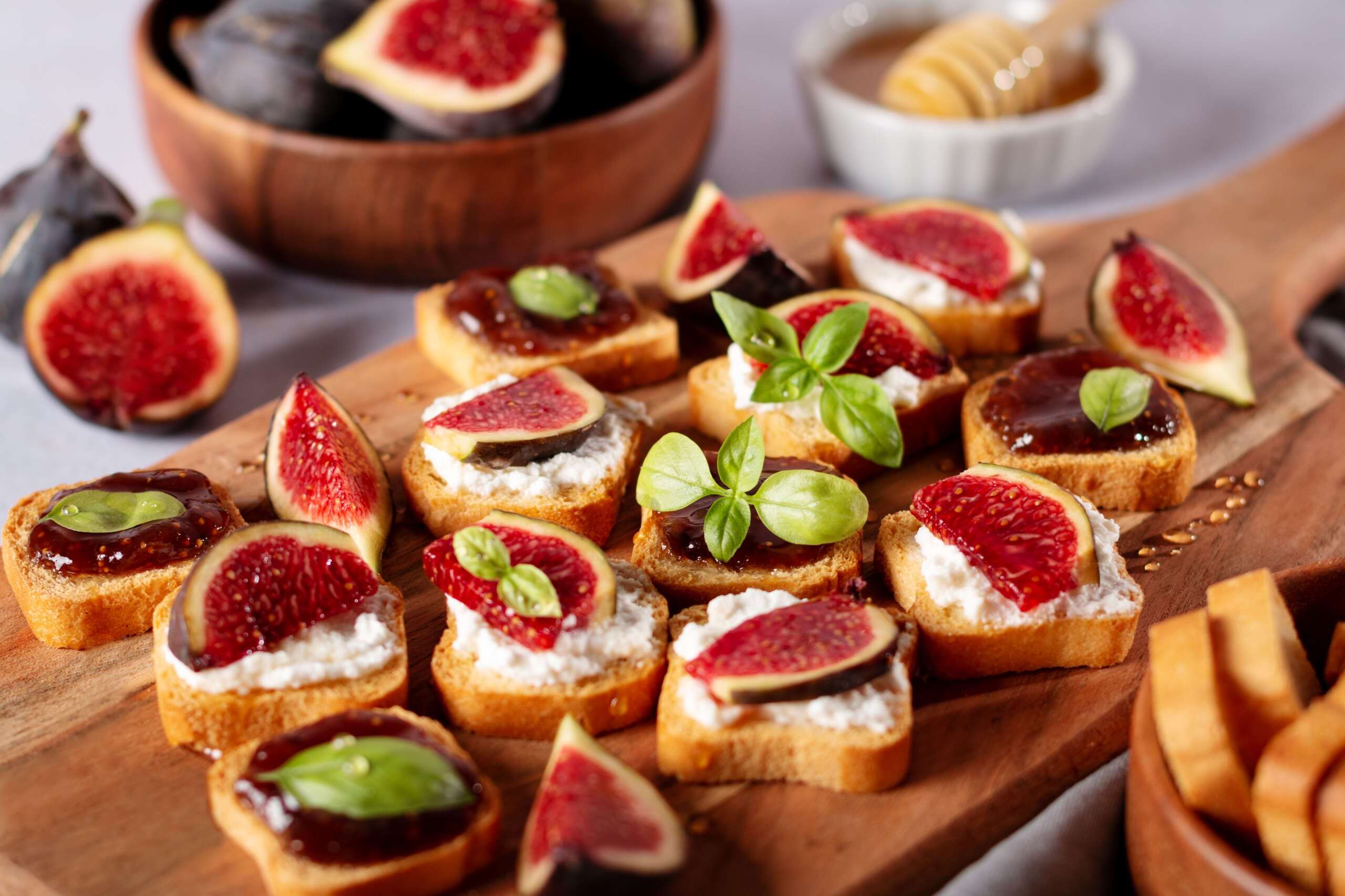 Canape Board Display featuring Toasts with Figs, Ricotta, and Fig Marmalade